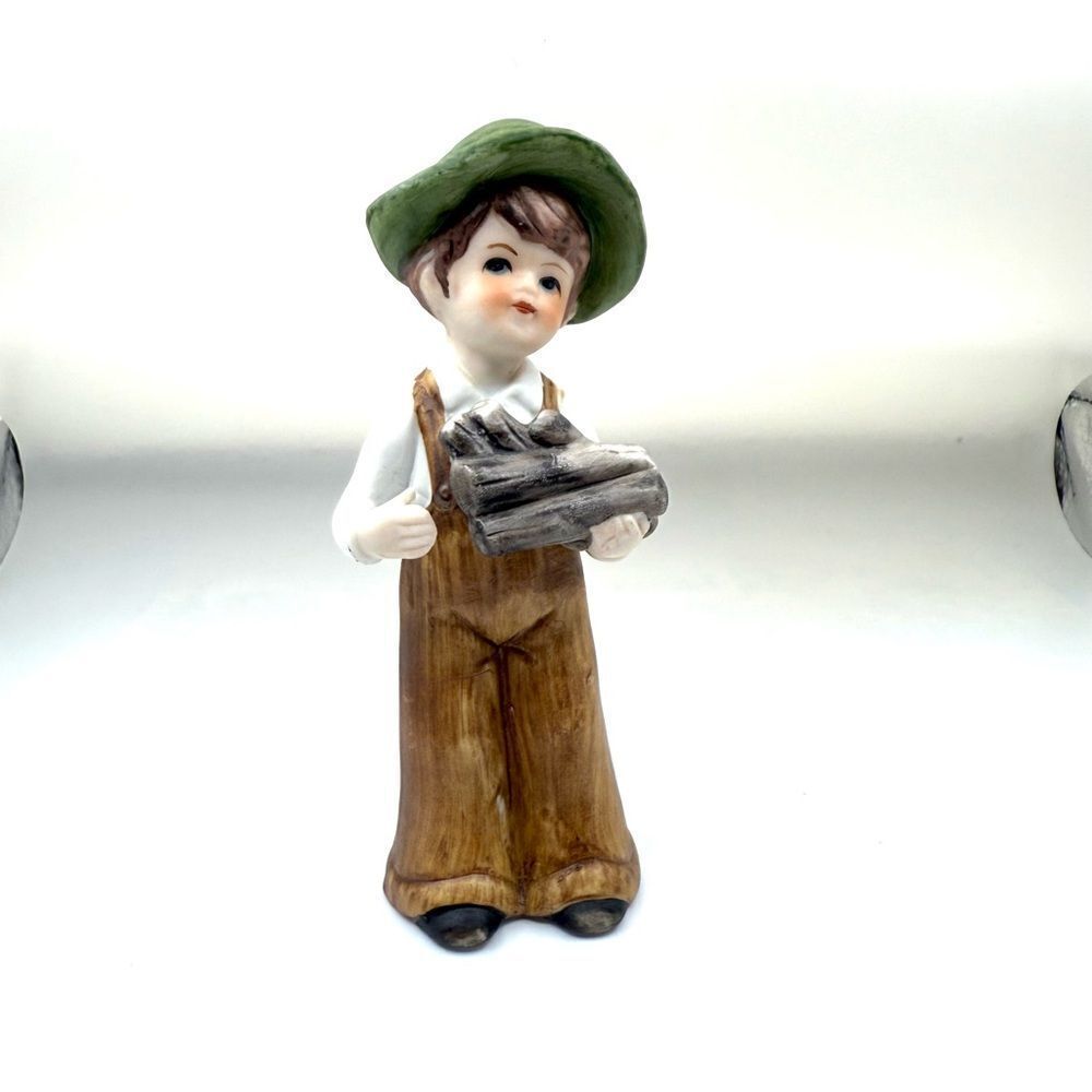 Boy Holding Logs Hand Painted Porcelain Figure 4in. Tall